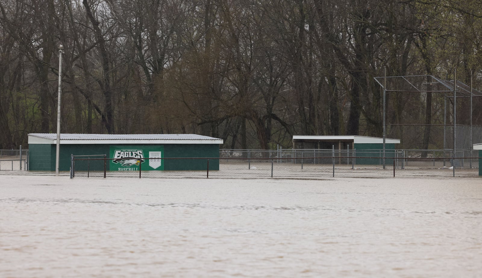Baseball fields used by Troy Junior Baseball and Troy Christian High School near North County Road 25A and the Great Miami River were underwater in early April 2025. BRYANT BILLING/STAFF