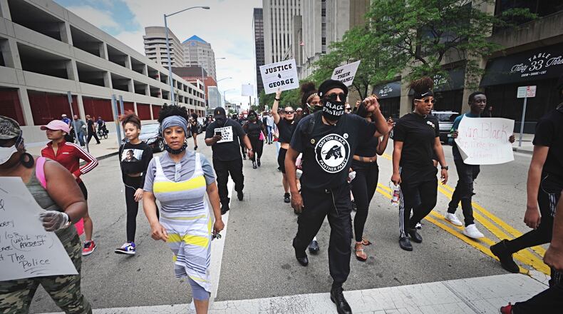 A protest event that began at the federal building in downtown Dayton on Saturday, May 30, 2020, moved to the area of Jones Street and Wayne Avenue, where police stopped marchers from entering U.S. 35 by using pepper spray balls and a line of officers. MARSHALL GORBY / STAFF