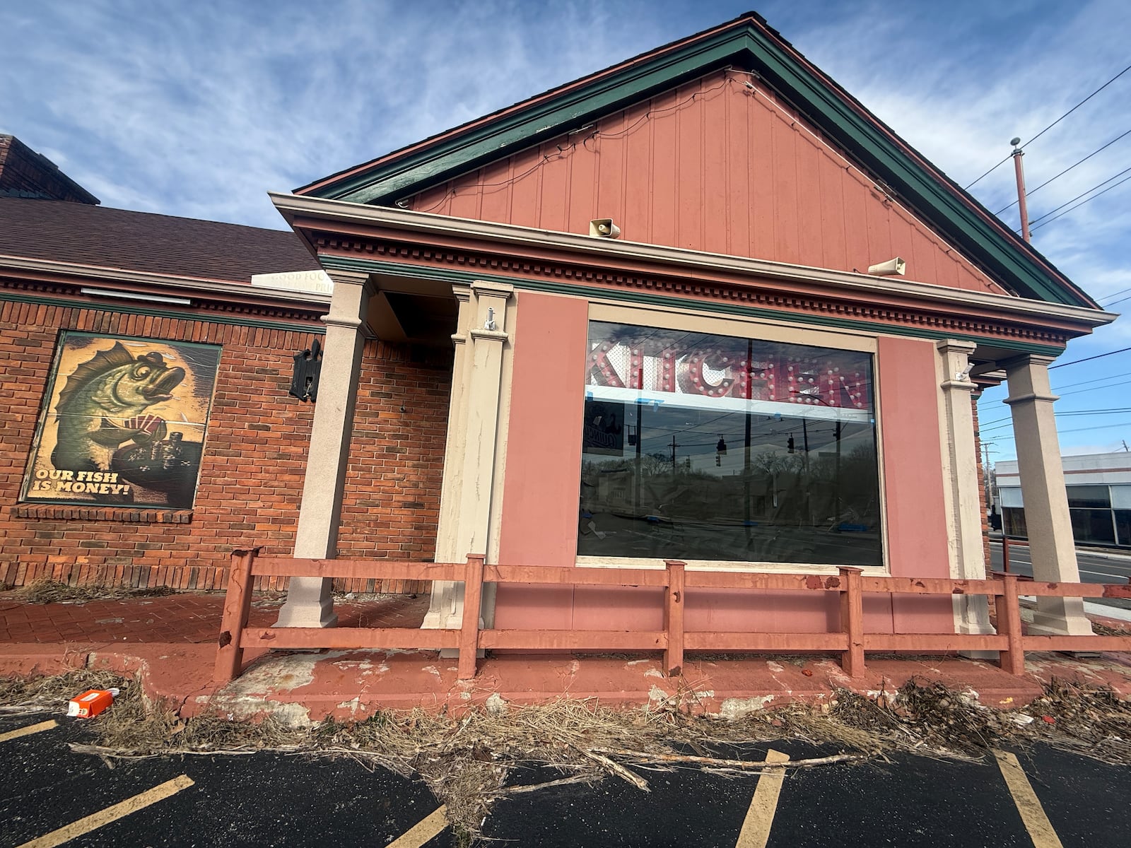 Anthony Head, owner of Chicken Spot LLC, received $128,000 from the city of Dayton to renovate this building at 865 N. Main St. into a new restaurant called Chicken Head's. The restaurant never opened and the city alleges ownership has not explained how it spent $48,000 of the money it received. The city has filed a lawsuit seeking repayment of that grant funding. CORNELIUS FROLIK / STAFF