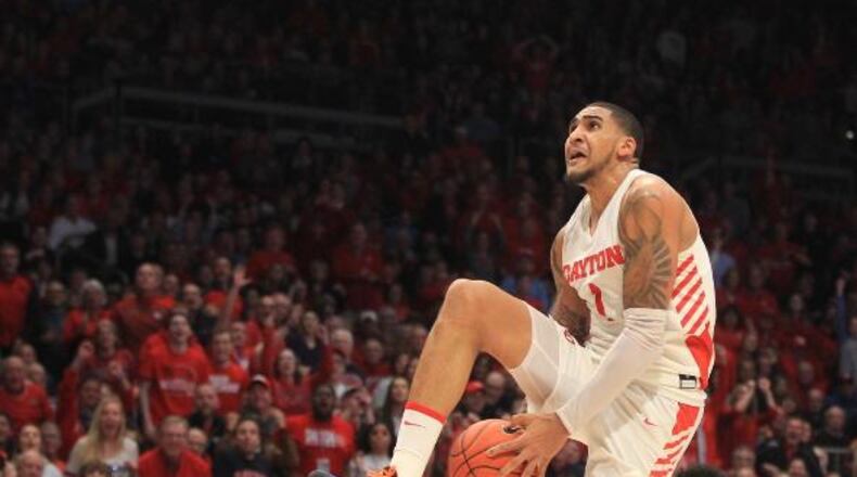 Dayton’s Obi Toppin dunks against George Washington on Saturday, March 7, 2020, at UD Arena. David Jablonski/Staff