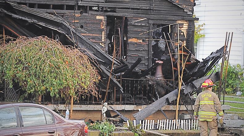 A house on Great Miami Boulevard in Dayton was severely damaged during a fire early on Friday, Oct. 23, 2020. STAFF PHOTO / MARSHALL GORBY