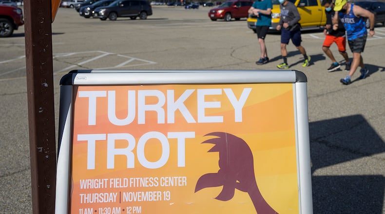 Participants take off from the starting line of the 88th Force Support Squadron’s 2020 Turkey Trot 5K Fun Run at Wright-Patterson Air Force Base on Nov. 19. U.S. AIR FORCE PHOTO/WESLEY FARNSWORTH