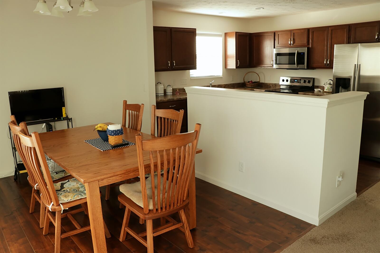 A partial wall divides the kitchen from the breakfast room and allows for additional cabinetry and countertop space within the kitchen’s cooking area CONTRIBUTED PHOTO BY KATHY TYLER