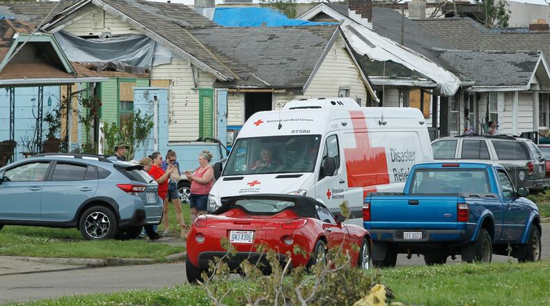 Red Cross Disaster Relief truck is parked along a tornado ravaged Macready Avenue. TY GREENLEES / STAFF
