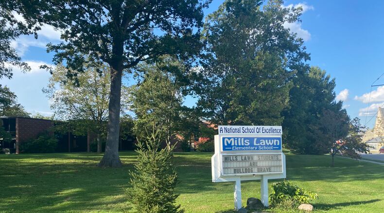 The controversy over what to do with the small green area behind Mills-Lawn elementary school has affected people across Yellow Springs. Eileen McClory / staff