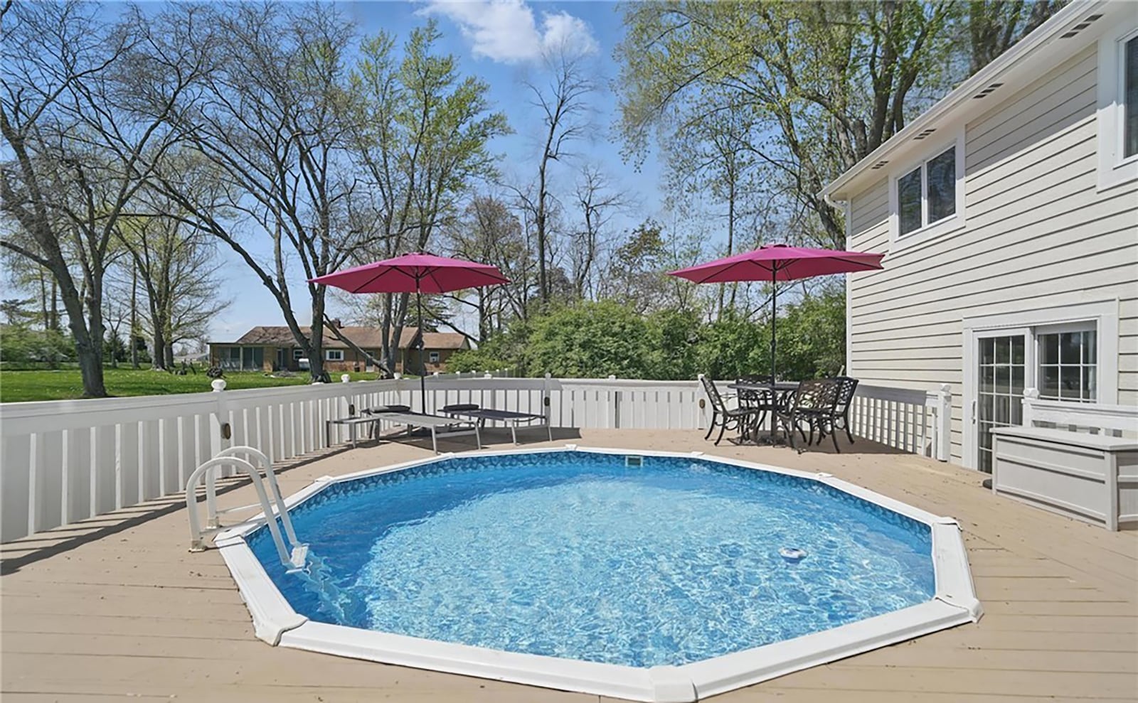 The rear deck has a plunge style pool and there is a vinyl privacy fence. CONTRIBUTED