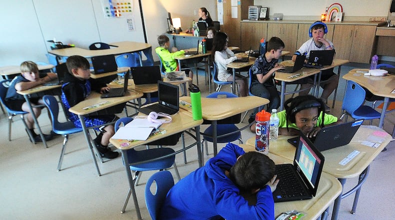 Third-graders in the classroom of Lauren Jones at the Fairborn Intermediate School study at their desks. MARSHALL GORBY\STAFF