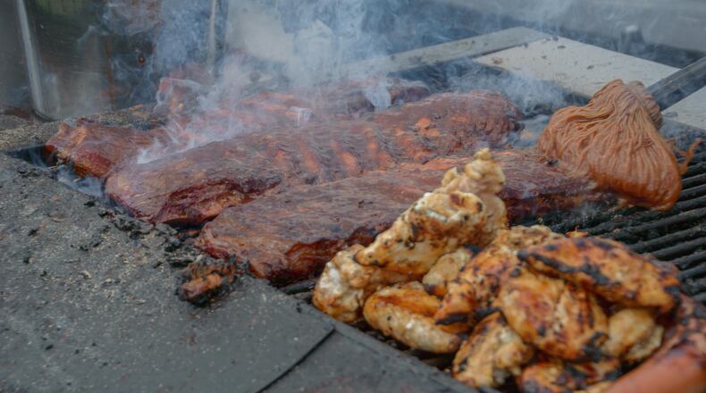 Soaring temperatures didn't everyone from enjoying the lip-smacking barbecue, chilled drinks and other live entertainment at the 2016 Huber Heights Ribfest on Sunday, July 24. (TOM GILLIAM/CONTRIBUTED)
