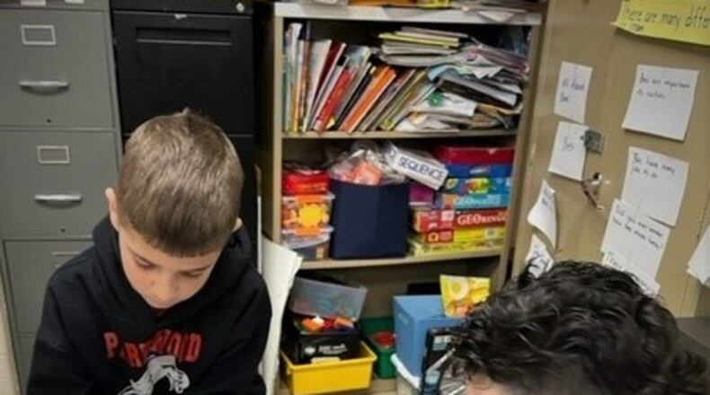 Second grade students at Parkwood Elementary in Beavercreek practice their interviewing skills.