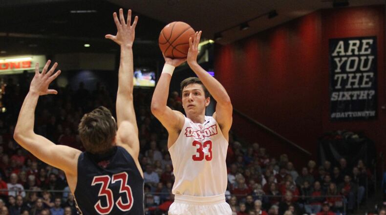 Dayton’s Ryan Mikesell shoots against Saint Mary’s on Saturday, Nov. 19, 2016, at UD Arena. David Jablonski/Staff