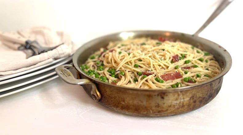 Pasta with bacon and peas is a dish that turns up on the family's meal table at least once every two weeks. WHITNEY KLING/CONTRIBUTED