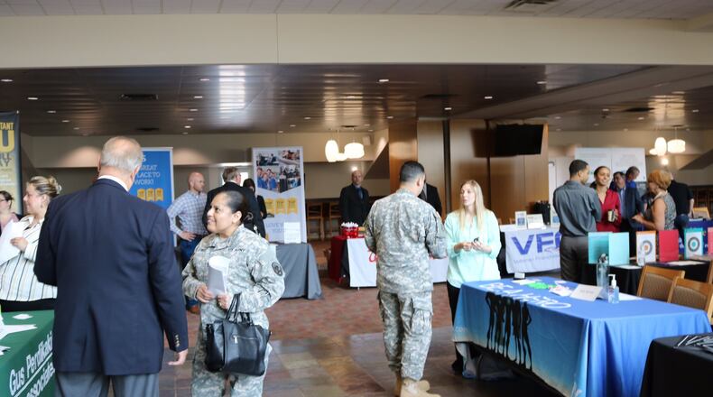 Participants and company officials talk during RecruitMilitary’s All-Veteran Career Fair in 2016. This year’s installment is scheduled for 11 a.m. to 3 p.m. Thursday, May 25, at Paul Brown Stadium.