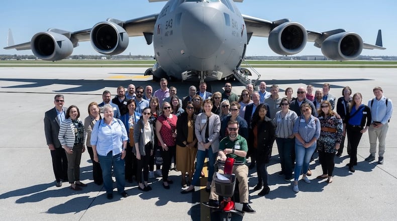 The 2023 Leadership Dayton class poses in front of a C-17 Globemaster III aircraft belonging to the 445th Airlift Wing April 12, 2023, at Wright-Patterson Air Force Base. Air Force photo by R.J. Oriez
