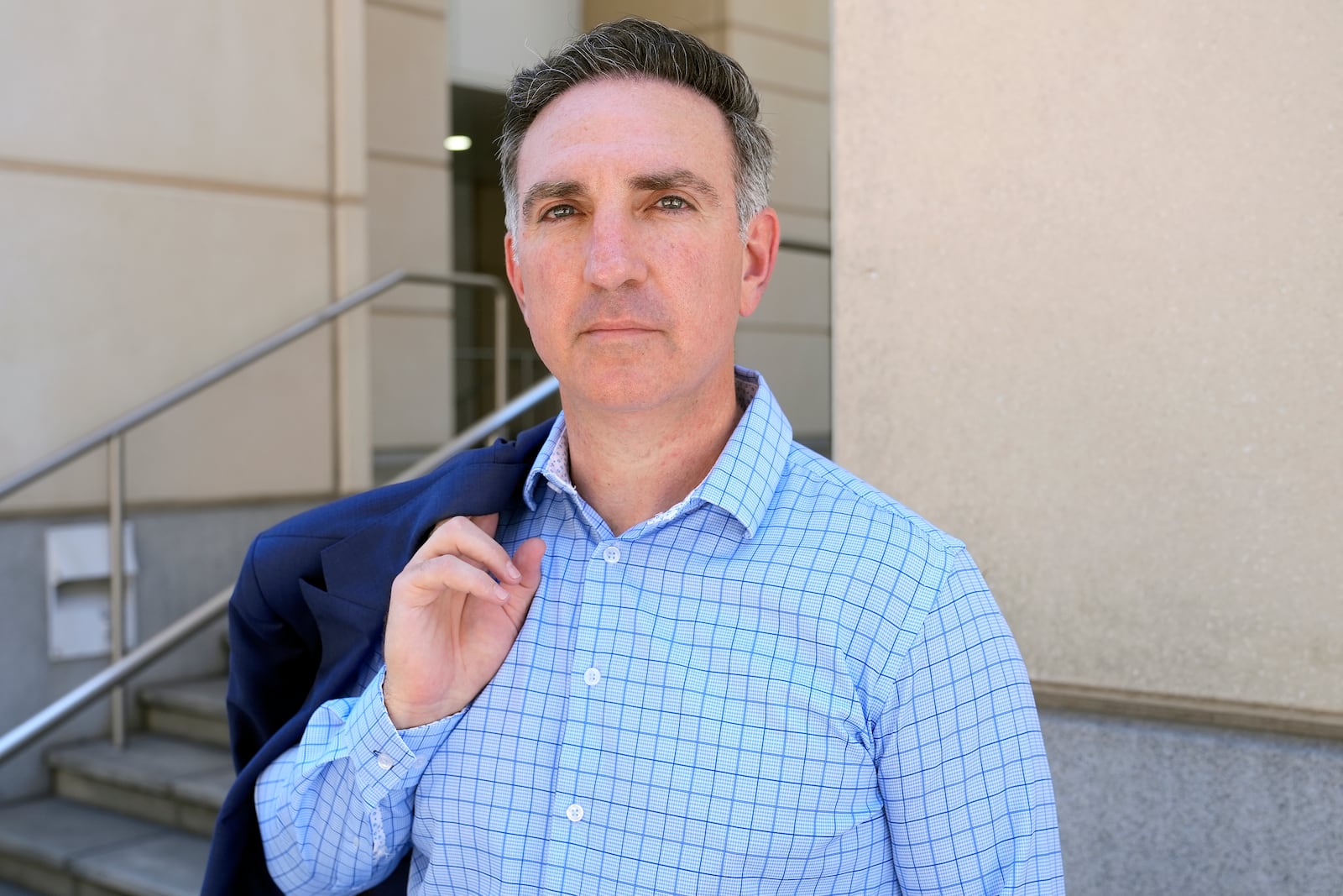 Former federal prosecutor Michael Gordon poses for a photo outside the Sam Gibbons United States Courthouse, Thursday, July 24, 2025, in Tampa, Fla. (AP Photo/Chris O'Meara)