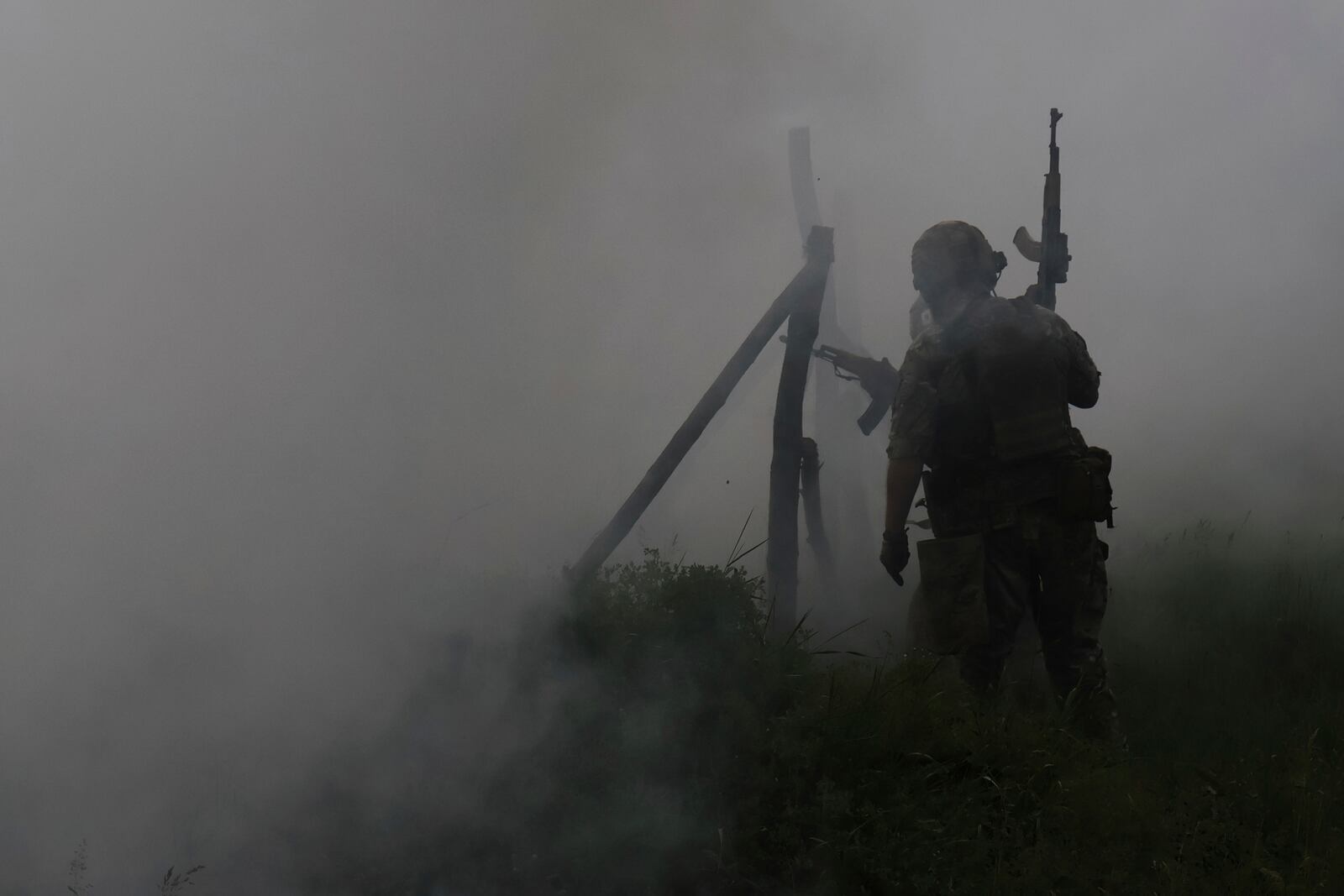 In this photo provided by Ukraine's 65th Mechanized Brigade press service, Ukrainian servicemen attend a military training in Zaporizhzhia region, Ukraine, Monday, May 26, 2025. (Andriy Andriyenko/Ukraine's 65th Mechanized Brigade via AP)
