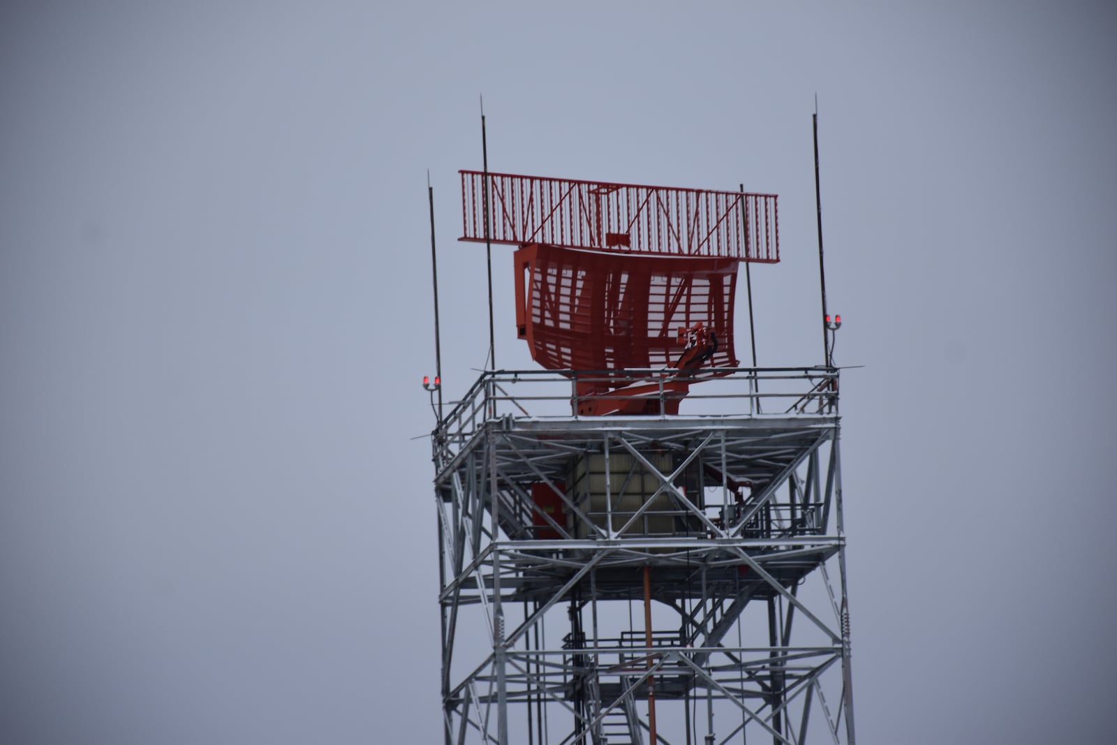 The city of Dayton is going to ask the Federal Aviation Administration to study relocating this radar tower facility on Old Springfield Road, northwest of the Dayton International Airport. Relocating the facility and equipment could open up 115 acres of vacant land for redevelopment. CORNELIUS FROLIK / STAFF