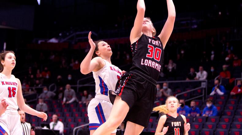 Fort Loramie's Dana Rose shoots against Convoy Crestview's Bailey Gregory during Thursday's Division IV state semifinal at UD Arena. Loramie won 66-24 and Rose scored 22 points. Jeff Gilbert/CONTRIBUTED