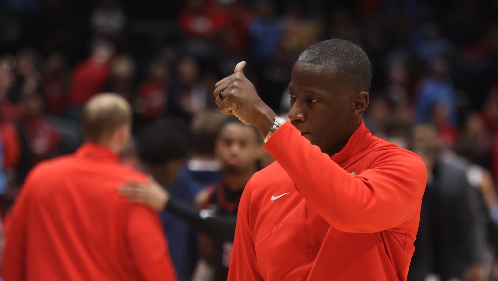 Dayton's Anthony Grant gives a thumbs-up after a victory against Saint Joseph’s on Friday, Jan. 24, 2025, at UD Arena. David Jablonski/Staff