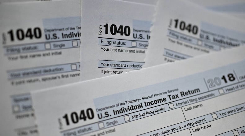 IRS 1040 individual tax forms. Bloomberg photo by Daniel Acker.