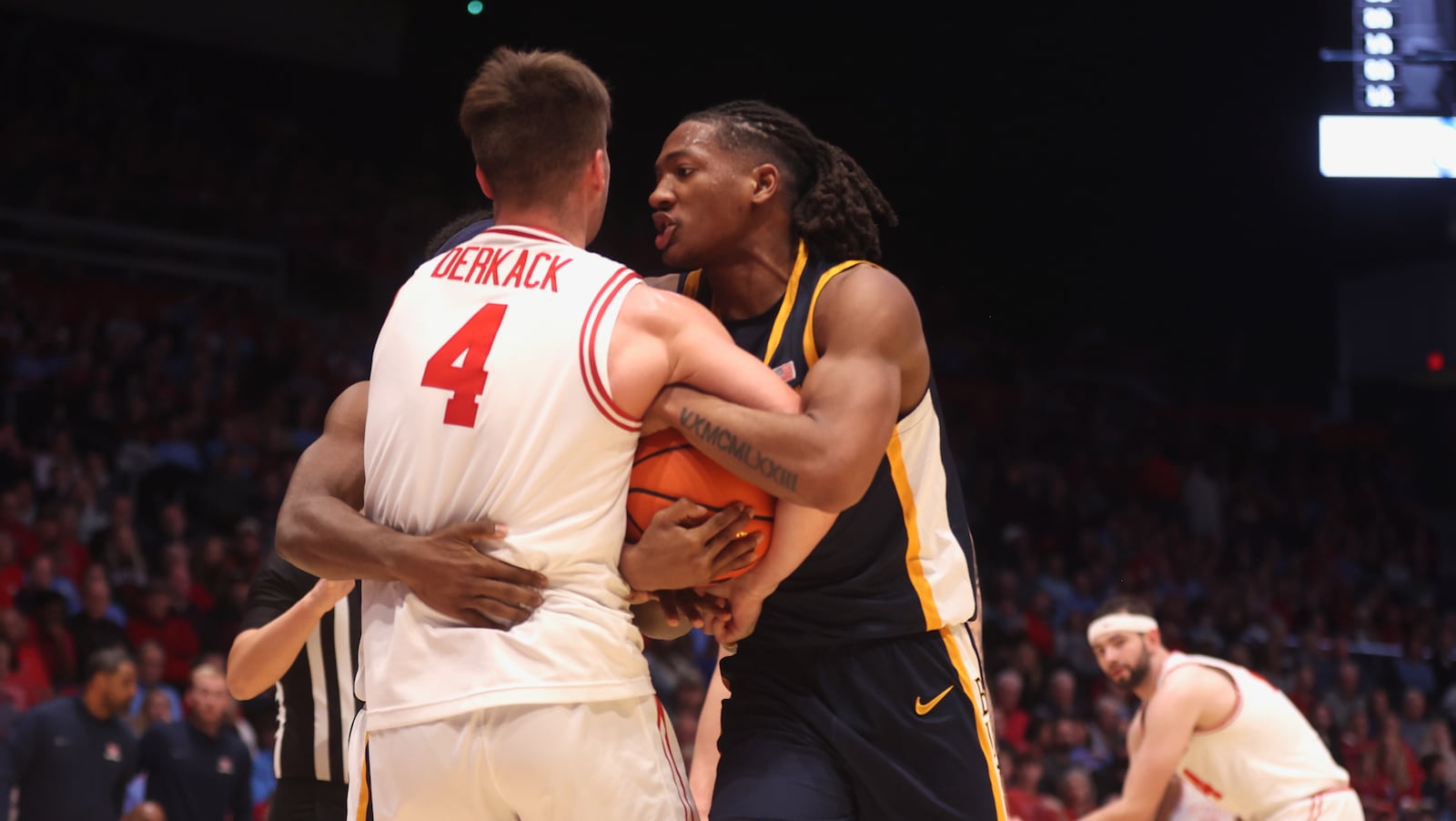 Dayton's Jordan Derkack competes for possession of the ball against East Tennessee State on Tuesday, Dec. 2, 2025, at UD Arena. David Jablonski/Staff