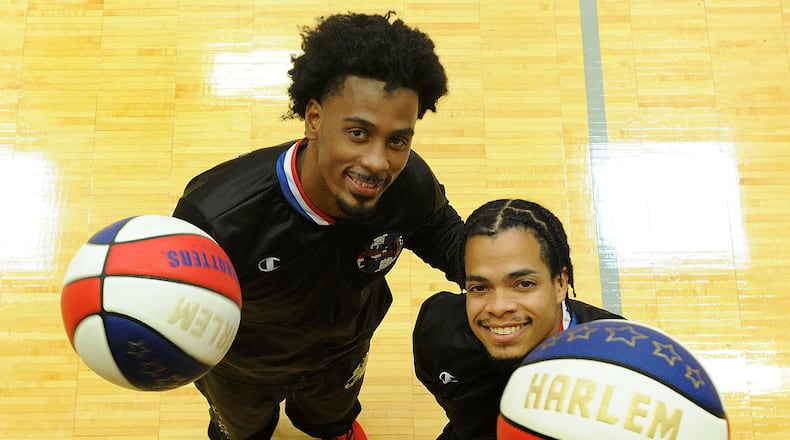 Harlem Globetrotters Rochelle “Wham” Middleton, right,  and Lucius “Too Tall” Winston visited the men’s and women’s basketball teams on Monday, Nov. 15, 2021 to talk about leadership, education and legacy. Both men attended HBCU’s. MARSHALL GORBY\STAFF