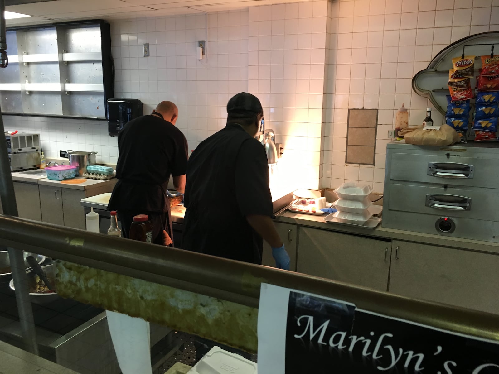 Albert Smith and a cook put together lunch orders