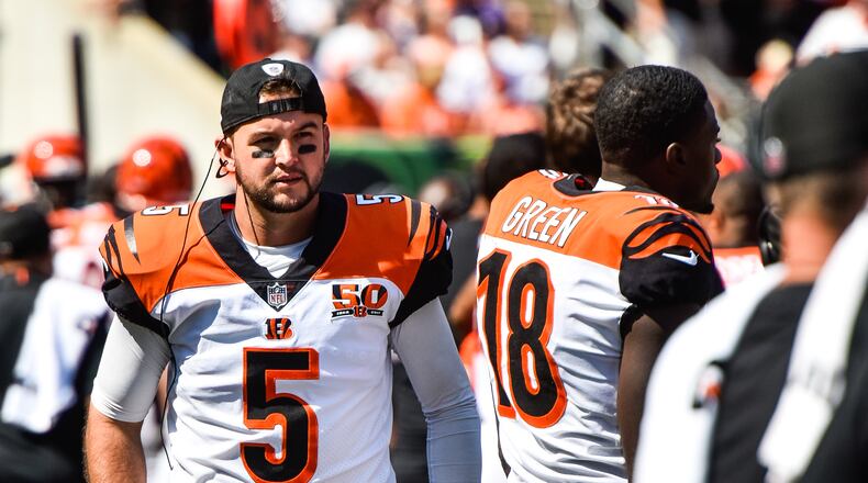 The Cincinnati Bengals quarterback AJ McCarron walks on the sideline during their 20-0 loss to the Baltimore Ravens Sunday, Sept. 10 at Paul Brown Stadium in Cincinnati. NICK GRAHAM/STAFF