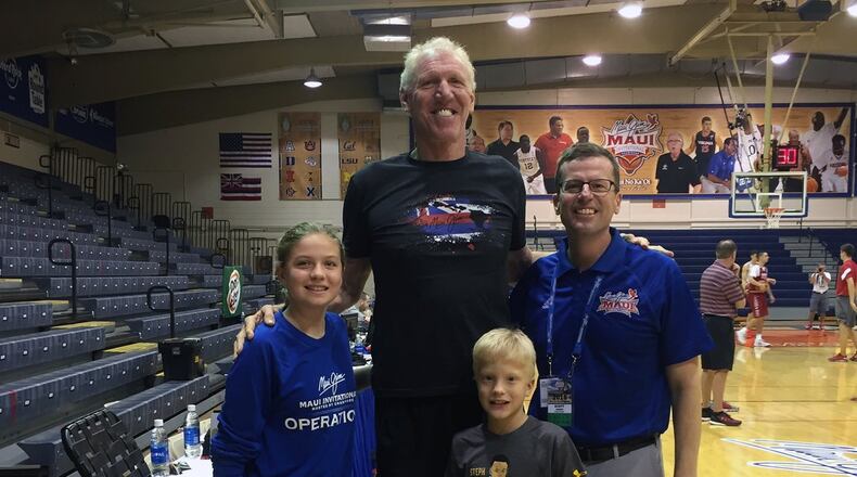 Scott Janess (right) with his children, Camron (front) and Mara (left), and ESPN analyst Bill Walton (middle) at the 2016 Maui Jim Maui Invitational. CONTRIBUTED