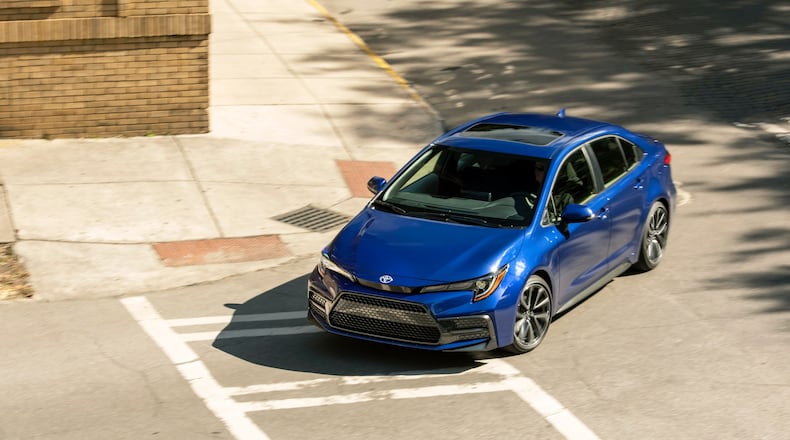 This photo from Toyota shows the Corolla sedan. It's not as enjoyable to drive as the Civic but is otherwise strong on value. (Toyota via AP)