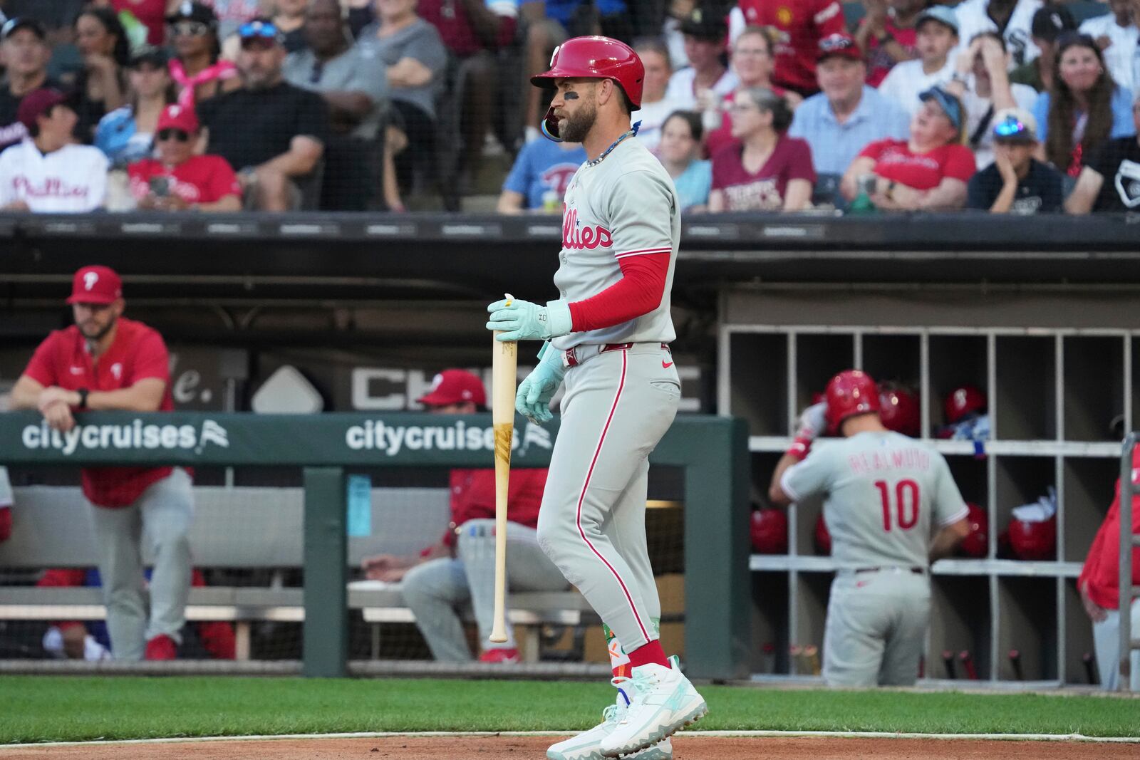 Philadelphia Phillies' Bryce Harper looks to the field after striking out swinging during the first inning of a baseball game against the Chicago White Sox in Chicago, Monday, July 28, 2025. (AP Photo/Nam Y. Huh)