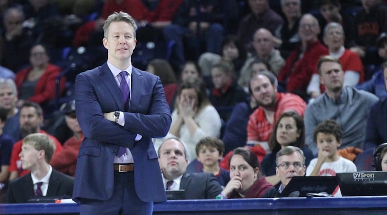 Richmond’s Chris Mooney watches the action during a game against Dayton on Tuesday, Jan. 9, 2018, at the Robins Center in Richmond, Va. David Jablonski/Staff