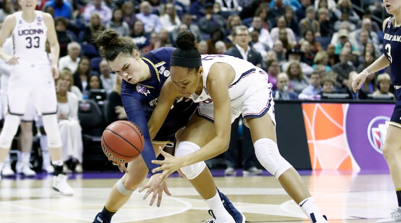 Kathryn Westbeld #33 of the Notre Dame Fighting Irish battles for the ball with Azura Stevens #23 of the Connecticut Huskies during the second half in the semifinals of the 2018 NCAA Women’s Final Four at Nationwide Arena on March 30, 2018 in Columbus, Ohio. (Photo by Andy Lyons/Getty Images)