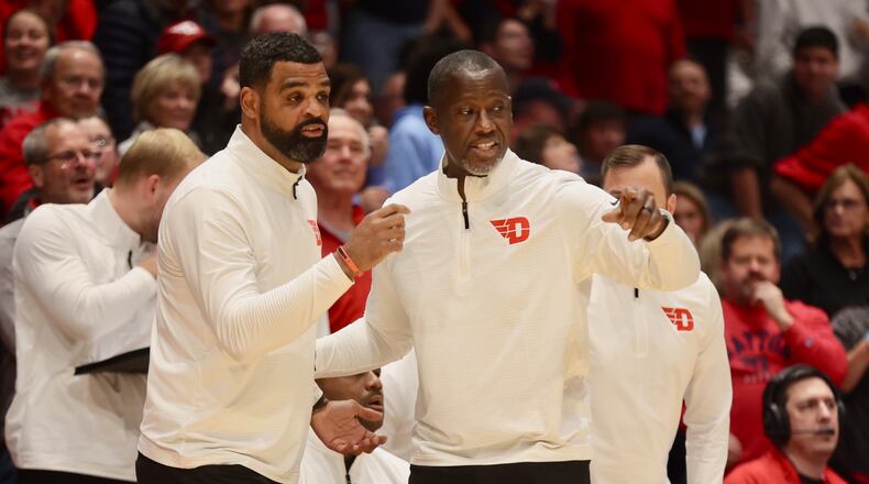 Dayton's Ricardo Greer and Anthony Grant coach during a game against Northwestern on Saturday, Nov. 9, 2024, at UD Arena. David Jablonski/Staff