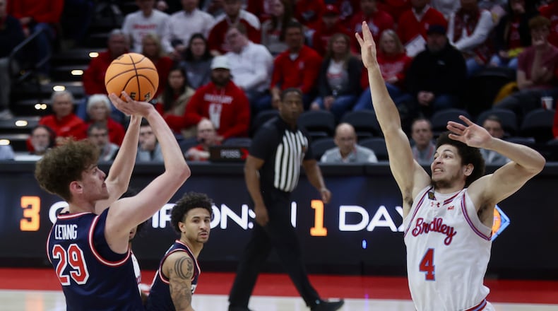 Dayton's Amaël L'Etang shoots in the first half against Bradley in the first round of the National Invitation Championship on Wednesday, March 18, 2026, at Carver Arena in Peoria, Ill. David Jablonski/Staff