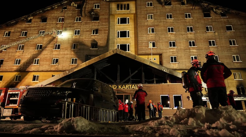 FILE - Firefighters and emergency teams work after a fire that broke out at a hotel in the ski resort of Kartalkaya, located in Bolu province, northwest Turkey, on Jan. 21, 2025. (AP Photo/Francisco Seco, File)