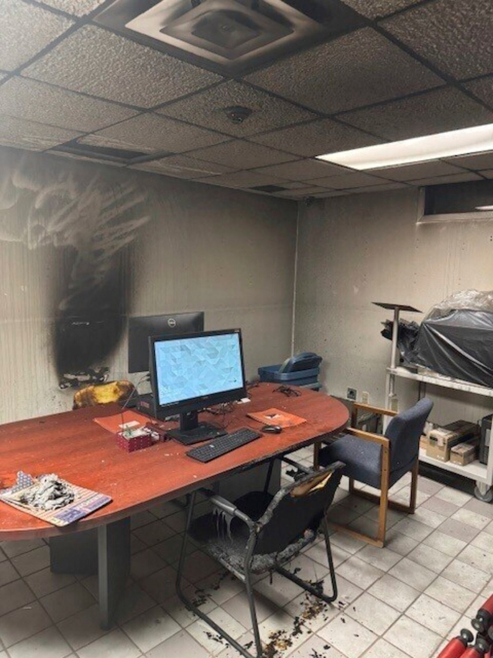 This image provided by the Archuleta County Clerk & Recorder shows damage from a fire inside a room in the Archuleta County Clerk Recorder's office in Pagosa Springs, Colo. (Archuleta County Clerk & Recorder via AP)