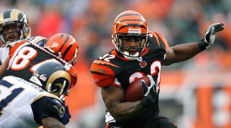 Former Bengals halfback Rudi Johnson, ranked by fans and media as the No. 21 retired Cincinnati player, is seen here picking on the Rams in a 2007 game at Paul Brown Stadium.