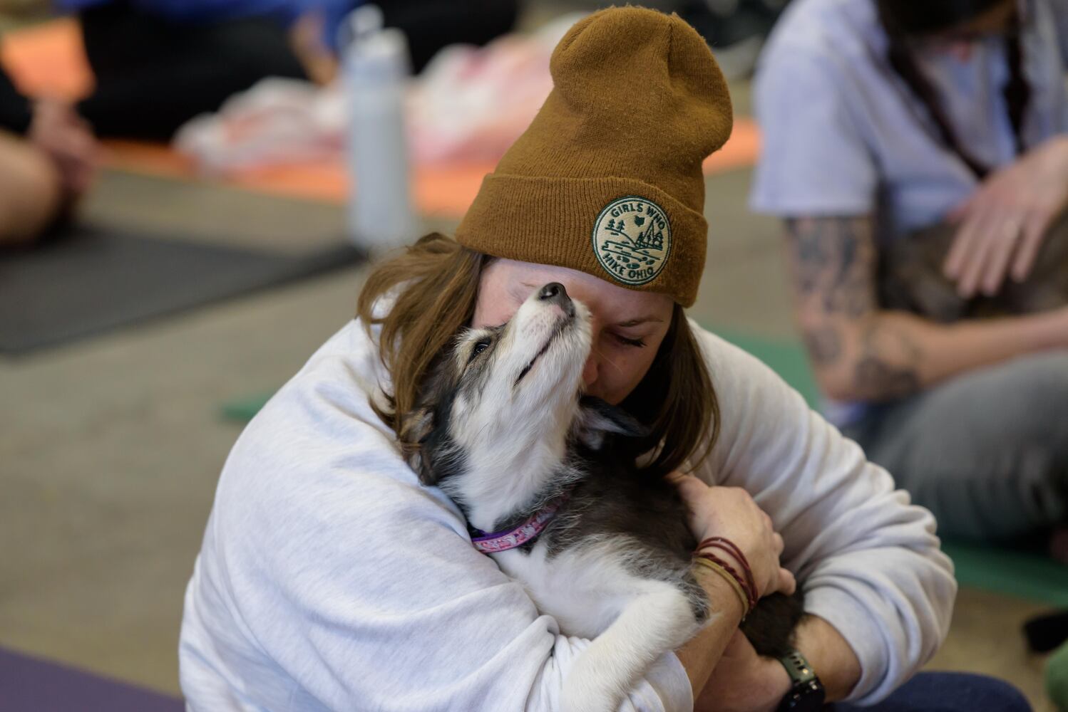 PHOTOS: Puppy Yoga with Adopt a Pit at Base Camp Outdoors Co. in downtown Dayton