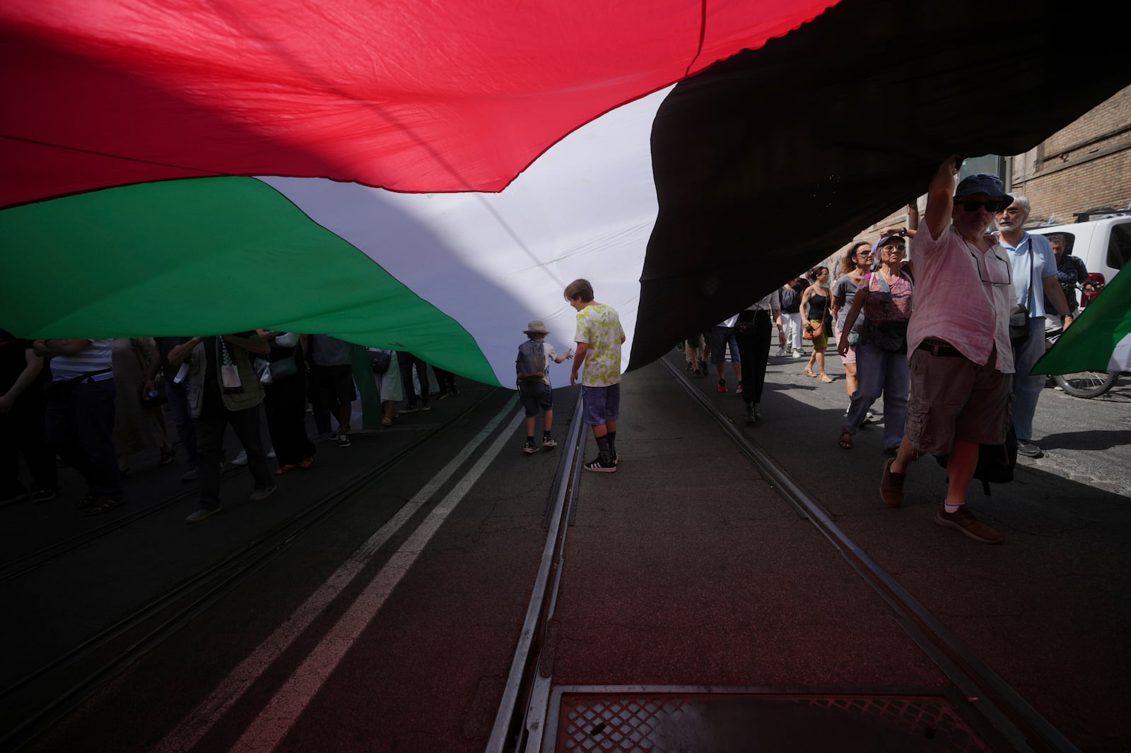 Protesters gather for a pro-Palestinian demonstration in Rome, Saturday, June 7, 2025. (AP Photo/Alessandra Tarantino)