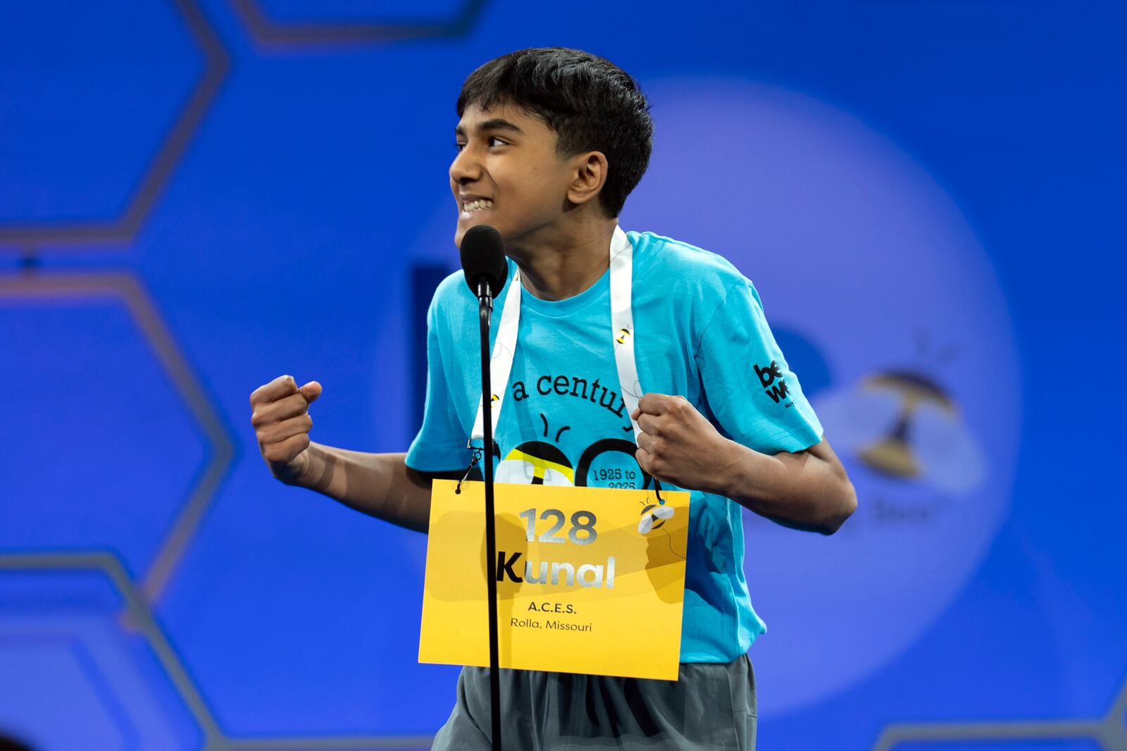 Kunal Patel, 12, of, Rolla, Mo., reacts after correctly spelling his word as he competes during the first preliminary round of the Scripps National Spelling Bee at the Gaylord National Resort & Convention Center, Tuesday, May 27, 2025, in Oxon Hill, Md. (AP Photo/Jose Luis Magana)