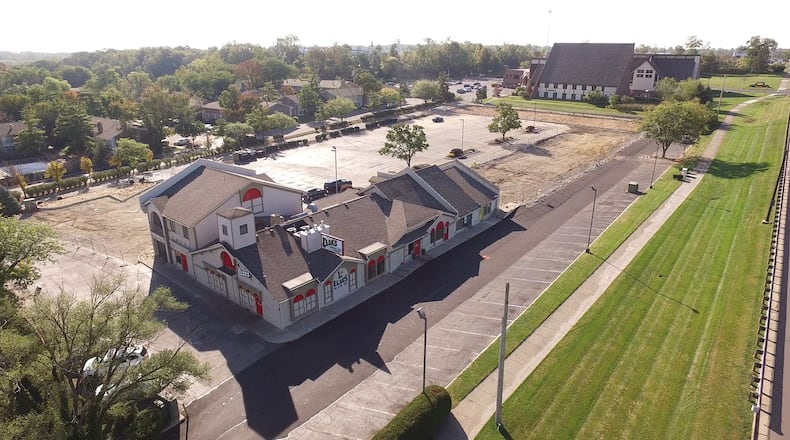 An Elsa's Mexican Restaurant sits along Far Hills Avenue in Centerville, with Epiphany Lutheran Church in the background.  Sheetz, Morse Road Development LLC and Hemmert Far Hills LLC are suing Epiphany, Bethany Village retirement community and the city of Centerville in hopes of constructing a 6,139-square-foot Sheetz on the site of the restaurant. STAFF FILE PHOTO