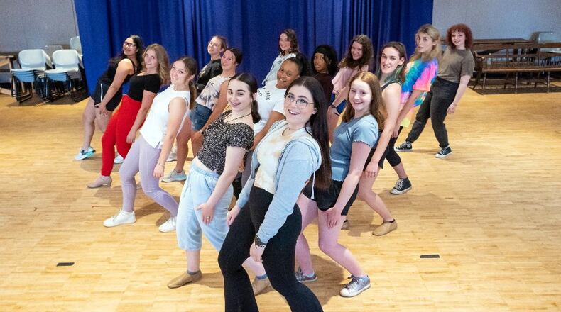 Isabel Rawlins (center as Morticia Addams) and cast in rehearsals for the Muse Machine's production of "The Addams Family," slated June 17-19. PHOTO BY MATT SILVER