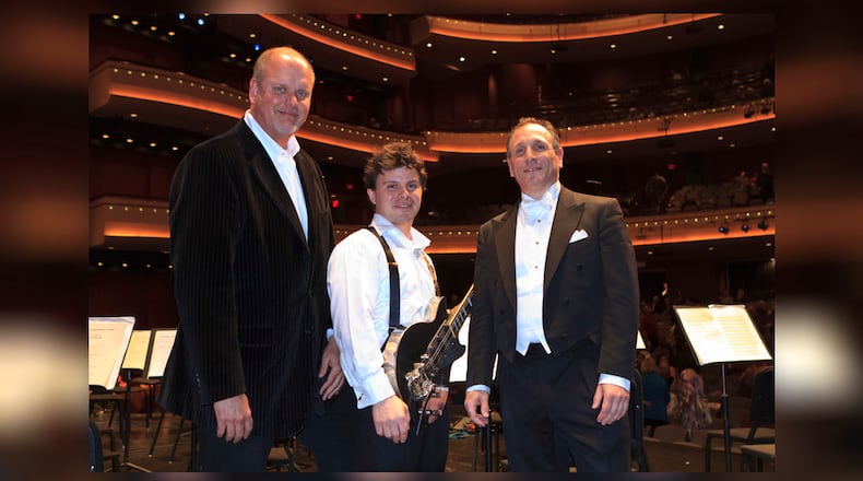 (left to right) Composer Michael Daugherty, guitarist D.J. Sparr and DPO Artistic Director and Conductor Neal Gittleman following a performance of “Gee’s Bend,” which is featured on the latest CD release from the Dayton Philharmonic Orchestra. PHOTO BY ANDY SNOW