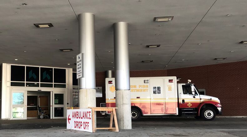 A Dayton Fire Department medic unit at a local hospital’s emergency room entrance. CORNELIUS FROLIK / STAFF