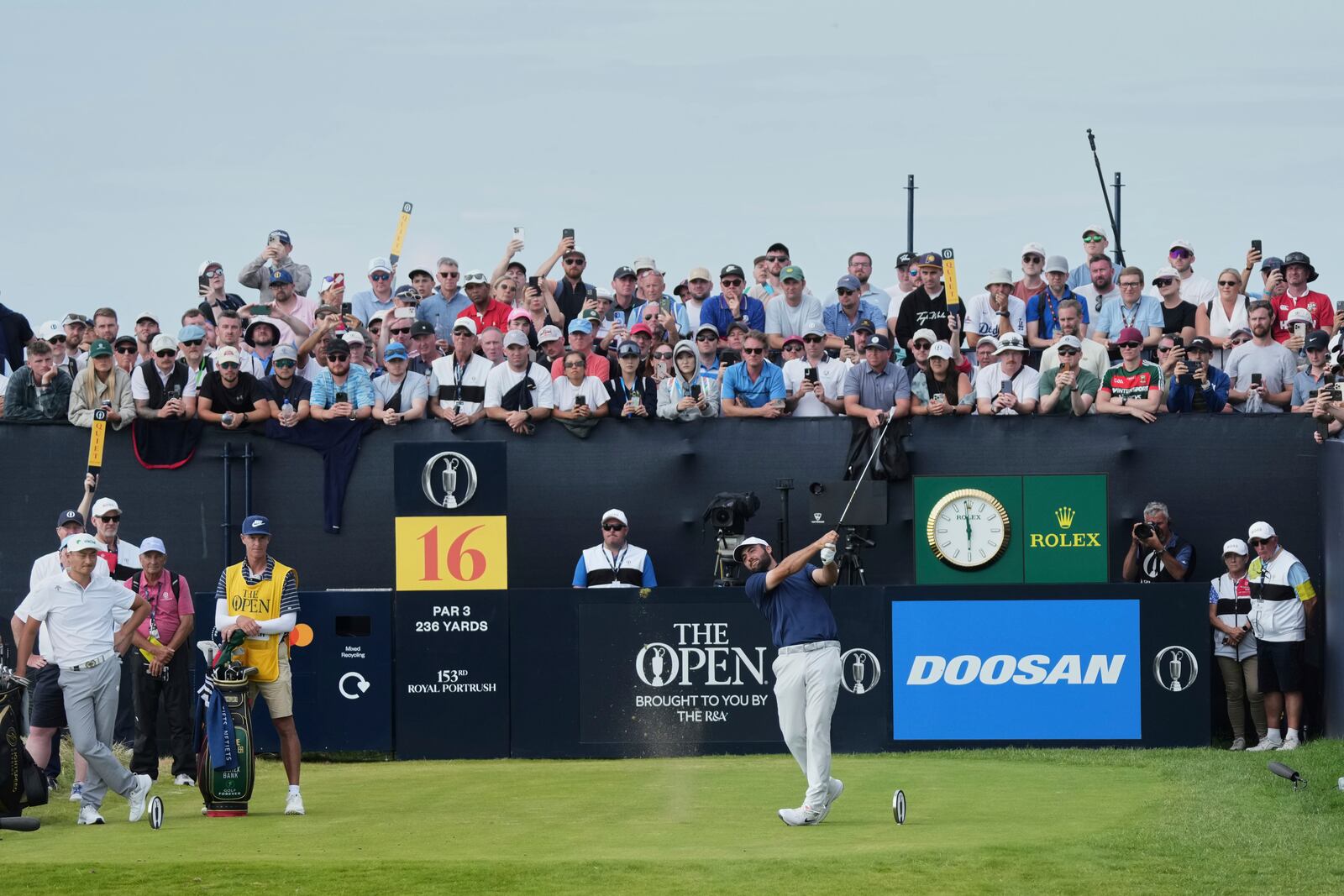 Scottie Scheffler of the United States tees off on the 16th hole during the final round of the British Open golf championship at the Royal Portrush Golf Club, Northern Ireland, Sunday, July 20, 2025. (AP Photo/Jon Super)