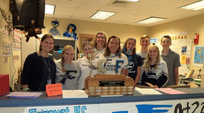 At Kettering Fairmont: Fairmont’s United Student Body leadership group is confident that students and the community will help them bring home the Spirit Chain trophy again this year. Pictured (from left) are Teacher/Activities Coordinator Corey Miller, Reilly Corbett, Olivia Priske, Ben Kelley, Audrey Albright, Katie Breslin, Noah Kihn, Emma Nichols and Ethan Crago. Not pictured: Thomas Siafa and Emily Kennebeck. CONTRIBUTED