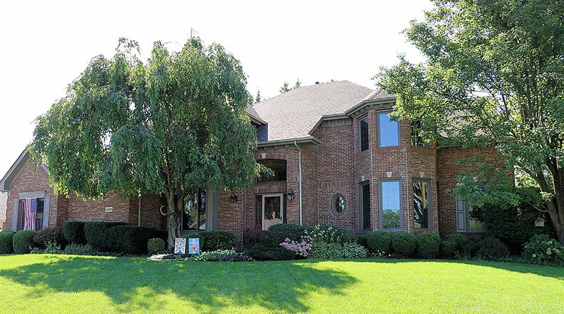 This former Homearama house has about 3,790 sq. ft. of living space plus a finished basement and a 4-season room. Located on a half-acre lot on a cul-de-sac, the home has a 3-car, side-entry garage. CONTRIBUTED PHOTO BY KATHY TYLER