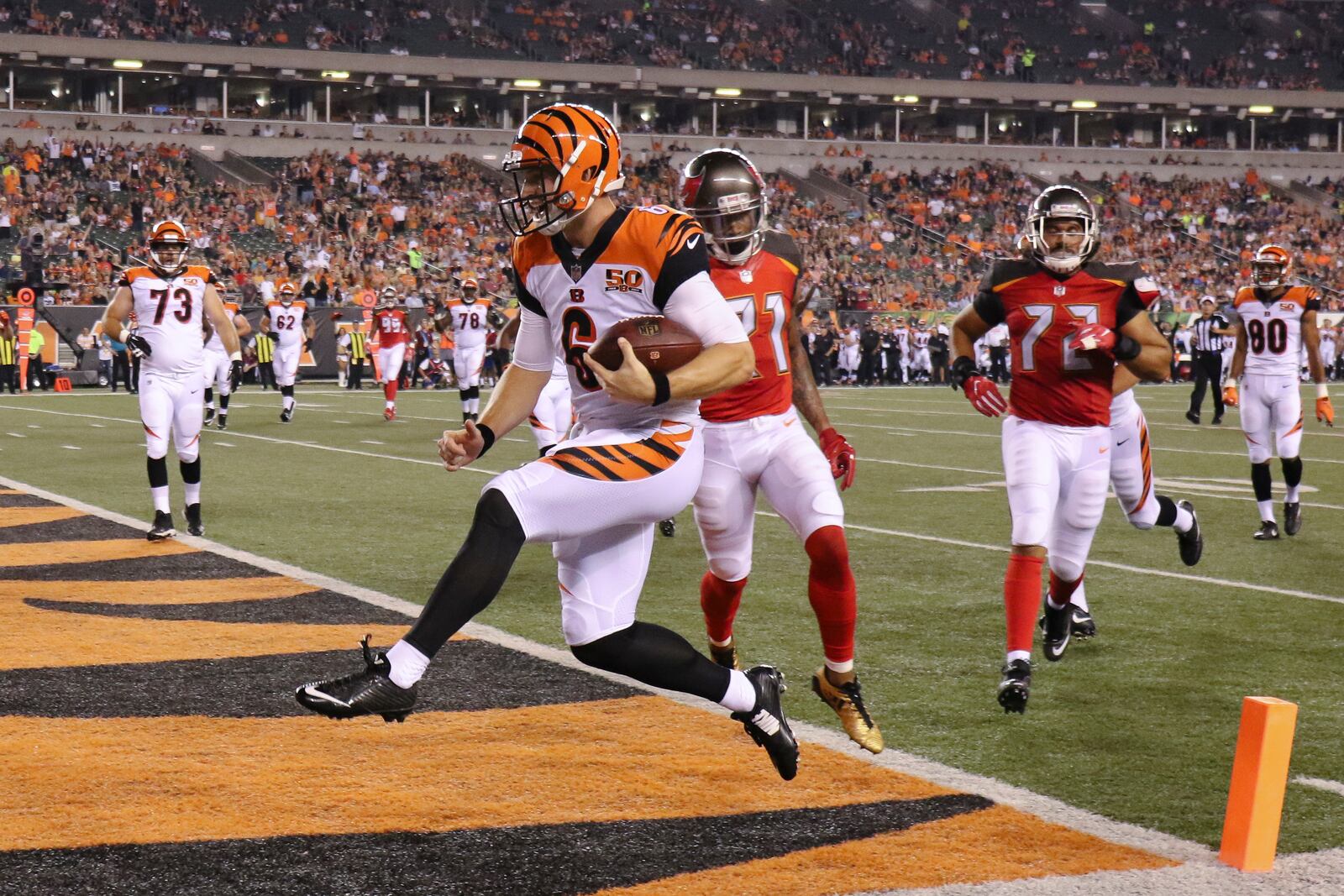 Cincinnati Bengals quarterback Jeff Driskel (6) runs in a touchdown during the second half of the team’s preseason NFL football game against the Tampa Bay Buccaneers, Friday, Aug. 11, 2017, in Cincinnati. (AP Photo/Gary Landers)