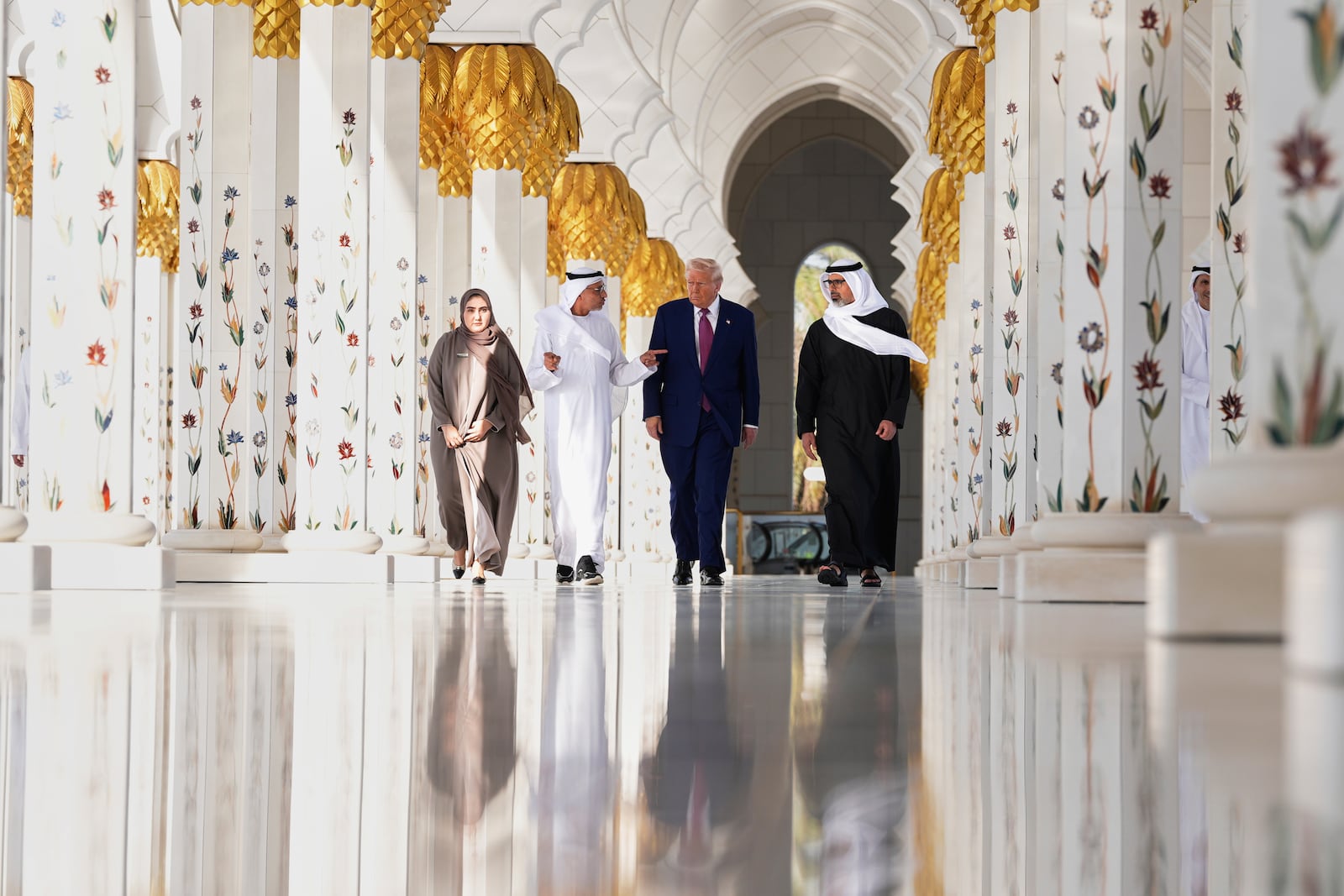 President Donald Trump and Sheikh Khaled Mohammed bin Zayed Al Nahyan, Crown Prince of Abu Dhabi, right, tour the Sheikh Zayed Grand Mosque, Thursday, May 15, 2025, in Abu Dhabi, United Arab Emirates. (AP Photo/Alex Brandon)