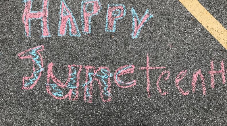 DECA Prep held a drive-thru Juneteenth celebration at the school on Homewood Avenue in Dayton on Friday, June 17, 2020. Deaunna Watson organized the event and said family and community were invited to the COVID-19 aware event. President Joe Biden on Thursday, June 17, 2021, signed a bill that established June 19 as a federal holiday to mark the end of slavery in the United States. JIM NOELKER/STAFF